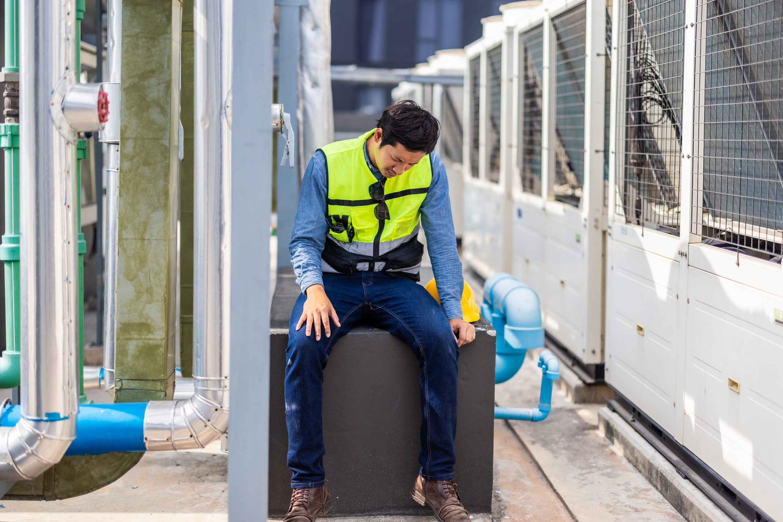 hvac-worker-facing-fatigue-and-headache-from-heat-stress