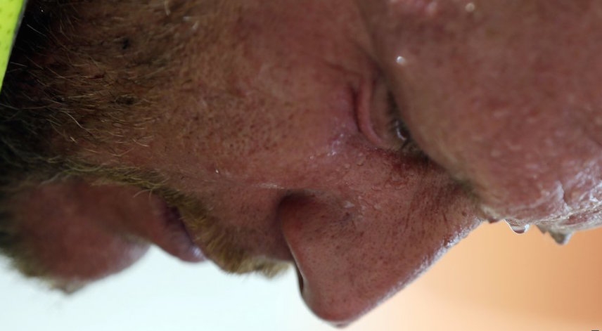 Worker in sweat due to hot weather