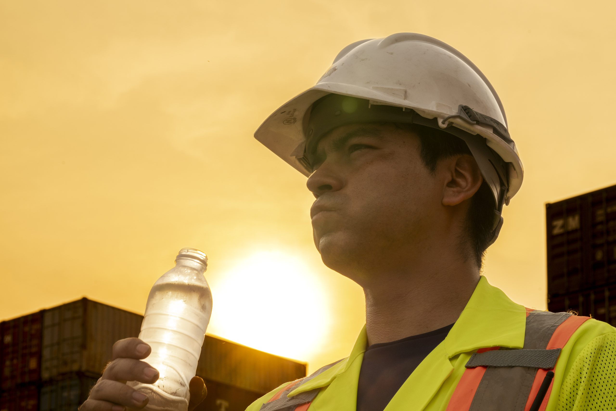 worker-working-on-site-under-the-heat-of-the-sun