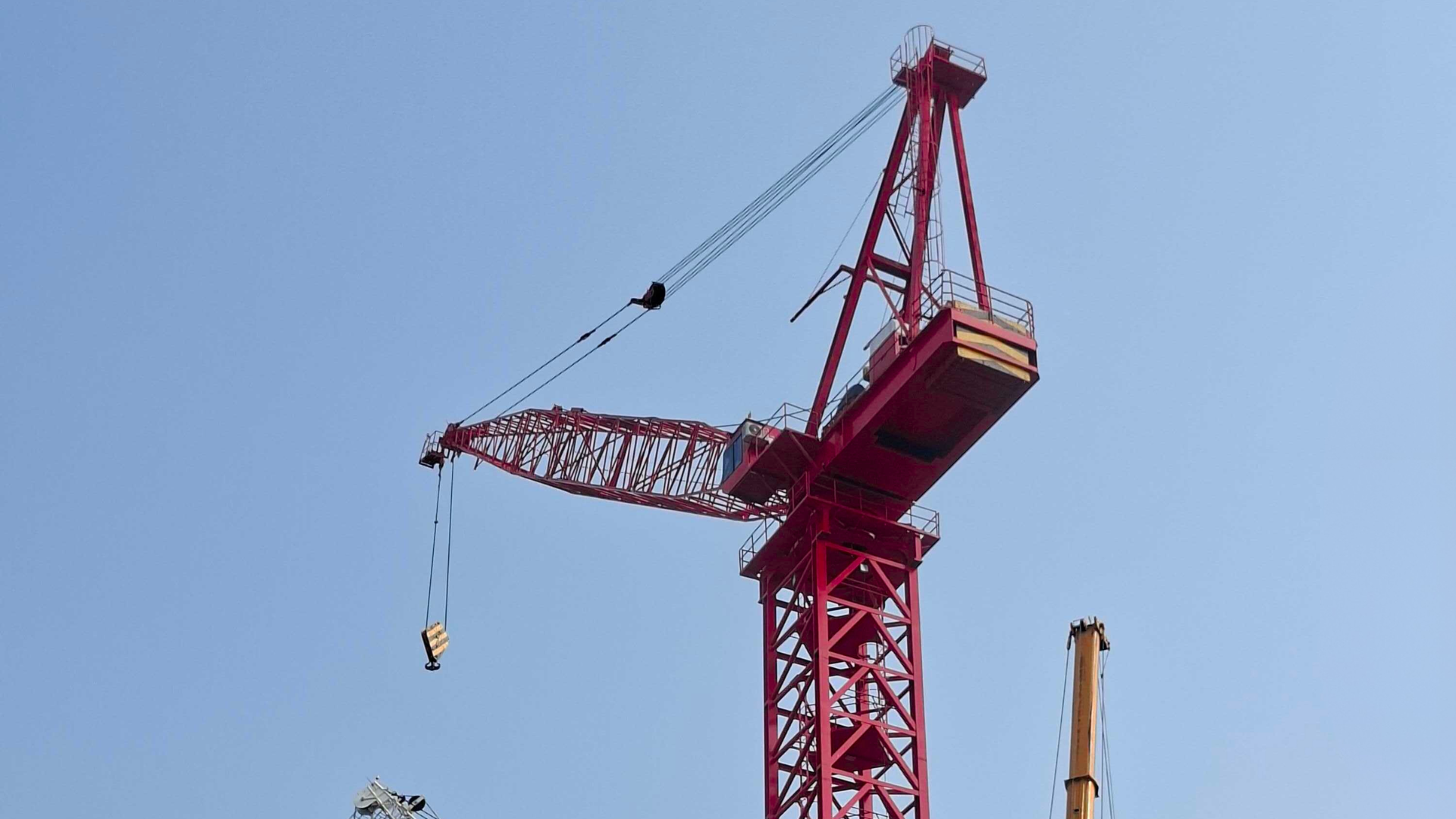 One of the tower cranes at the construction site.